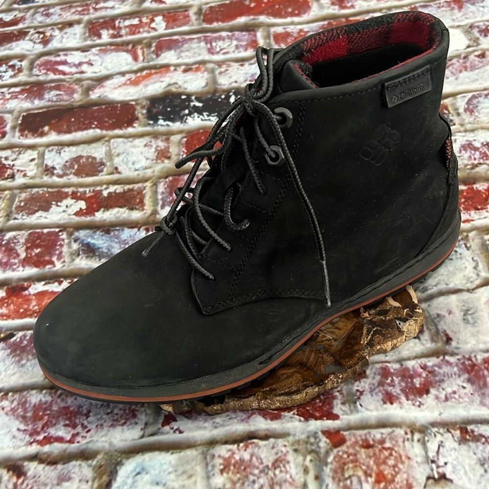 Columbia black boots with red plaid trim